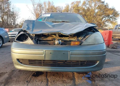 2003 Ford Focus Se z USA, uszkodzony, nr VIN 1FAFP34353W311314